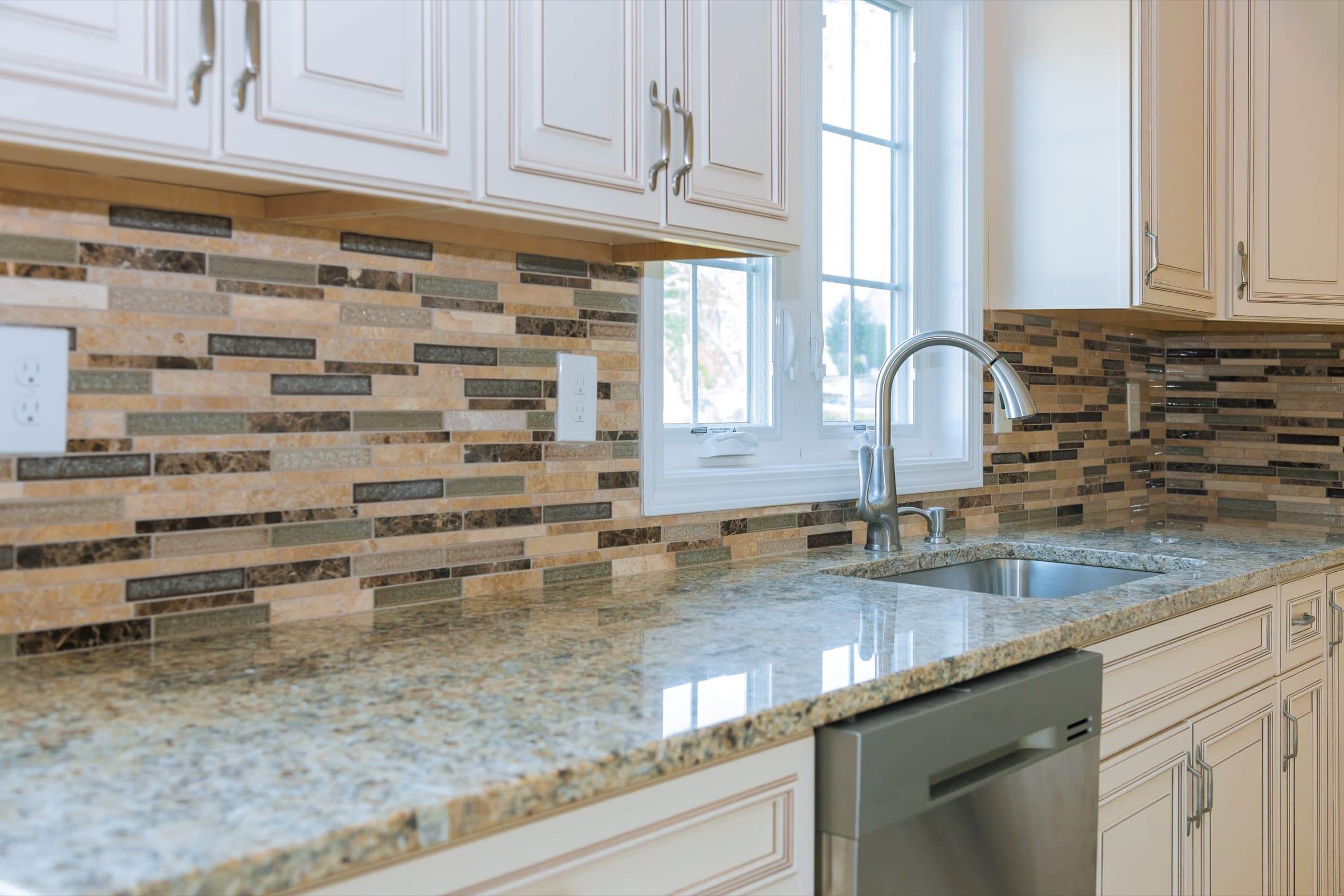 Granite with mosaic accent wall