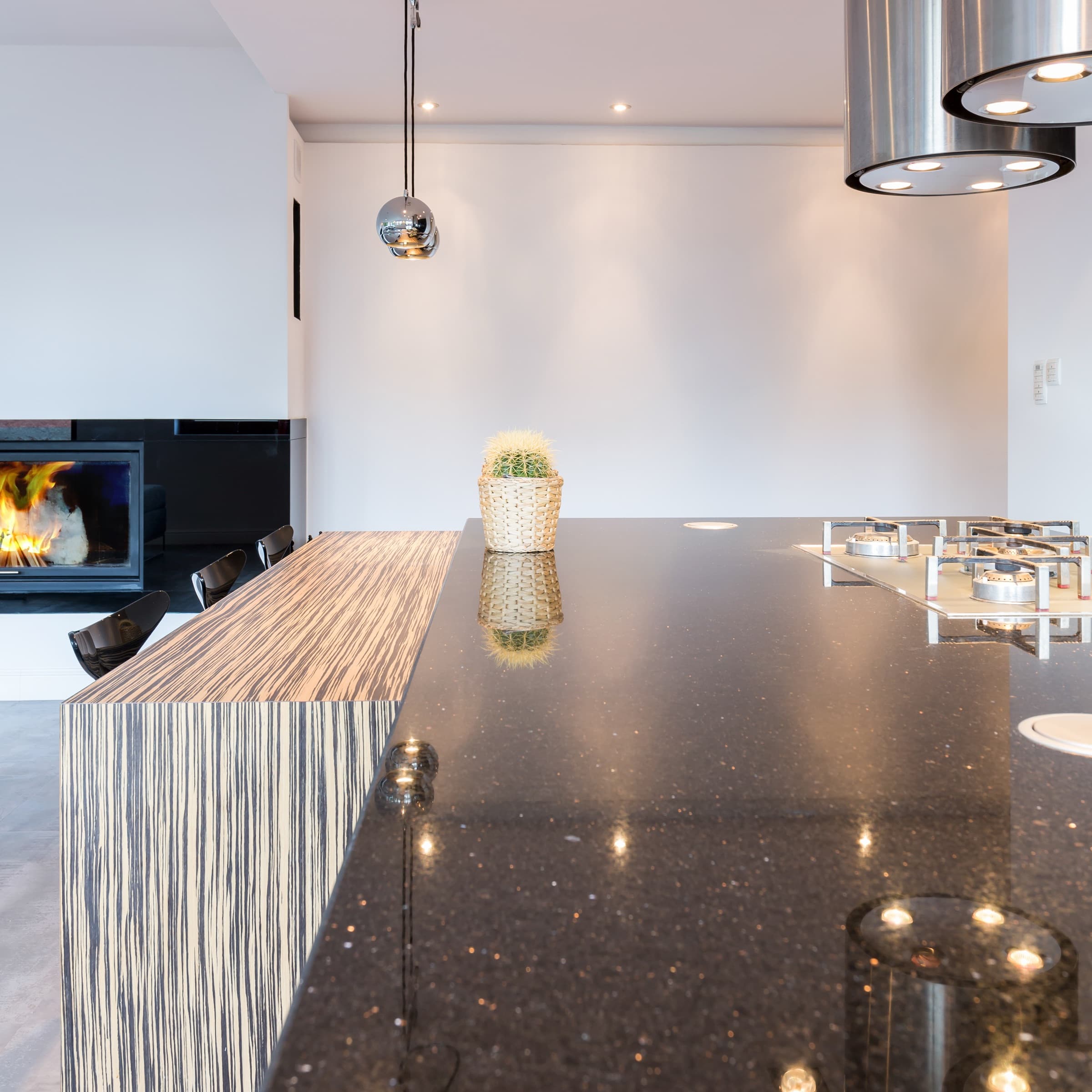 Kitchen + fireplace surround in matching stone
